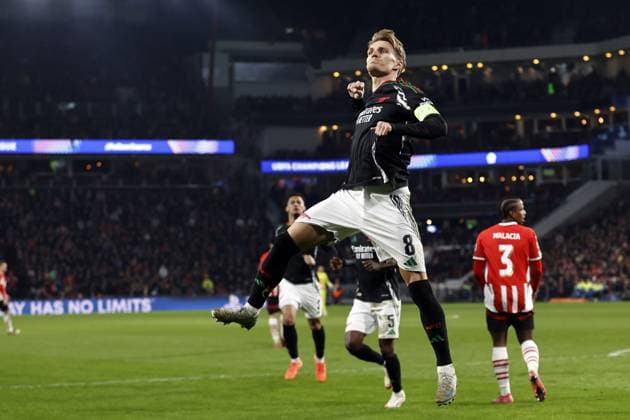 EINDHOVEN - Martin Odegaard of Arsenal FC celebrates 1-4 during the UEFA Champions league match between PSV Eindhoven and Arsenal FC at Phillips Stadium on March 4, 2025 in Eindhoven, Netherlands. ANP MAURICE VAN STEEN UEFA Champions League 2024 25 Round of 16 First leg 2024 25 xVIxANPxSportx xxANPxIVx 521572270 originalFilename: 521572270.jpg