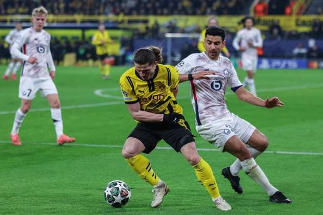 Soccer Champions League round of 16 Borussia Dortmund Lille OSC on 04 03 2025 at Signal Iduna Park in Dortmund Marcel Sabitzer Dortmund , left Benjamin Andre Lille , right xJRx