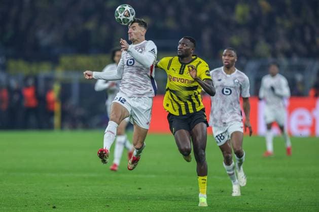 Soccer Champions League round of 16 Borussia Dortmund Lille OSC on 04 03 2025 at Signal Iduna Park in Dortmund Thomas Meunier Lille , left Serhou Guirassy Dortmund , right xJRx