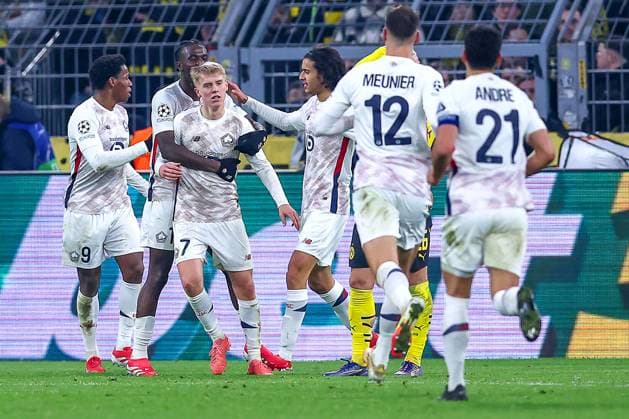 04 03 2025, Football, UEFA Champions League, Borussia Dortmund OSC Lille, Signal Iduna Park, Round of 16, Season 2024 2025 Goal celebration after the 1 1 equalizer by scorer Hakon Arnar Haraldsson LOSC Lille 7 North Rhine-Westphalia Germany