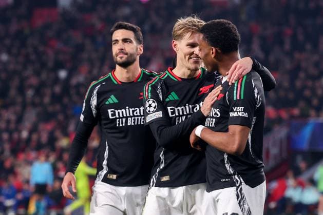 2025-03-04 PSV v Arsenal FC - UEFA Champions League 2024 25 Round of 16 First Leg EINDHOVEN, NETHERLANDS - MARCH 4: Martin Odegaard of Arsenal FC celebrates after scoring his teams sixth goal, Mikel Merino of Arsenal FC, Jurrien Timber of Arsenal FC during the UEFA Champions League 2024 25 Round of 16 First Leg match between PSV and Arsenal FC at PSV Stadion on March 4, 2025 in Eindhoven, Netherlands. Eindhoven PSV Stadion Netherlands Content not available for redistribution in The Netherlands directly or indirectly through any third parties. Copyright: xBenxGalx