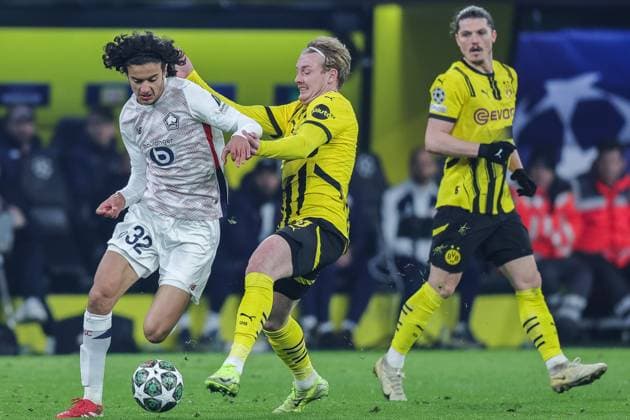 Soccer Champions League round of 16 Borussia Dortmund Lille OSC on 04 03 2025 at Signal Iduna Park in Dortmund Ayyoub Bouaddi Lille , left Julian Brandt Dortmund , right xJRx