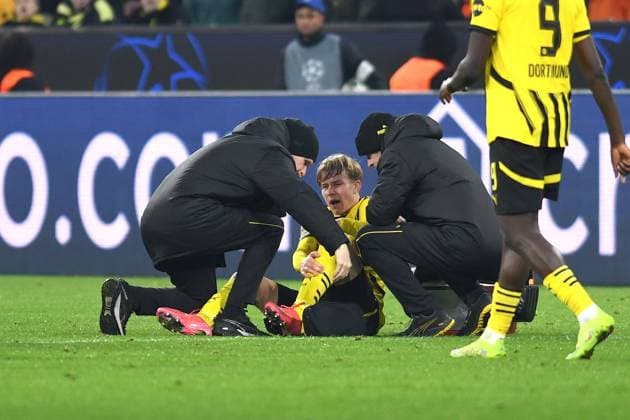 Daniel Svensson Borussia Dortmund injured during the UEFA Champions League 2024 25 Round of 16 First Leg match between Borussia Dortmund and LOSC Lille at Signal Iduna Park on March 4, 2025 in Dortmund, Germany Photo by Ralf Treese DeFodi Images