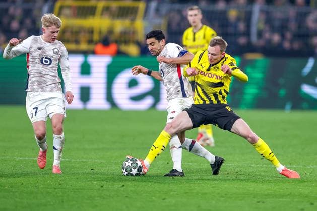 04 03 2025, Football, UEFA Champions League, Borussia Dortmund OSC Lille, Signal Iduna Park, Round of 16, Season 2024 2025 Benjamin Andre LOSC Lille 21 in duel against Maximilian Beier BVB 14 North Rhine-Westphalia Germany