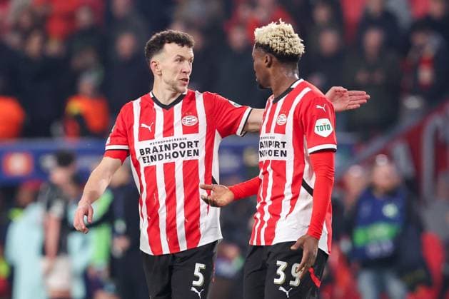 2025-03-04 PSV v Arsenal FC - UEFA Champions League 2024 25 Round of 16 First Leg EINDHOVEN, NETHERLANDS - MARCH 4: Ivan Perisic of PSV, Adamo Nagalo of PSV looks dejected after defeat after the UEFA Champions League 2024 25 Round of 16 First Leg match between PSV and Arsenal FC at PSV Stadion on March 4, 2025 in Eindhoven, Netherlands. Eindhoven PSV Stadion Netherlands Content not available for redistribution in The Netherlands directly or indirectly through any third parties. Copyright: xBenxGalx