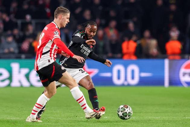 2025-03-04 PSV v Arsenal FC - UEFA Champions League 2024 25 Round of 16 First Leg EINDHOVEN, NETHERLANDS - MARCH 4: Joey Veerman of PSV battles for possession with Raheen Sterling of Arsenal FC during the UEFA Champions League 2024 25 Round of 16 First Leg match between PSV and Arsenal FC at PSV Stadion on March 4, 2025 in Eindhoven, Netherlands. Eindhoven PSV Stadion Netherlands Content not available for redistribution in The Netherlands directly or indirectly through any third parties. Copyright: xBenxGalx