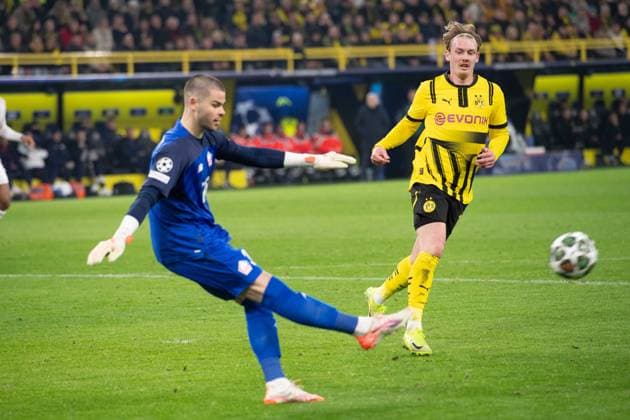 Goalkeeper Lucas CHEVALIER LOSC saves a goal chance from Julian BRANDT DO Action, duel, Football Champions League, Round of 16, Borussia Dortmund DO OSC Lille LOSC 1 1 on 04 03 2025 in Dortmund Germany UEFA regulations prohibit any use of photographs as image sequences and or quasi video Â