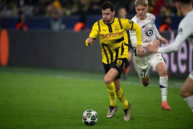 Pascal GROSS Groß, DO vs Hakon HARALDSSON LOSC Action, duel, Football Champions League, Round of 16, Borussia Dortmund DO OSC Lille LOSC 1 1 on 04 03 2025 in Dortmund Germany UEFA regulations prohibit any use of photographs as image sequences and or quasi video Â