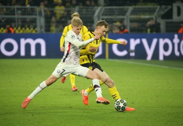 04 03 2025, xgrfx, Football UEFA Champions League, Borussia Dortmund Lille OSC v l Hakon Haraldsson Lille OSC , Maximilian Beier Borussia Dortmund DFL DFB REGULATIONS PROHIBIT ANY USE OF PHOTOGRAPHS as IMAGE SEQUENCES and or QUASI VIDEO Dortmund