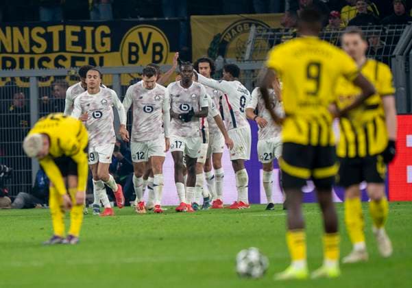 Cheers at OSC Lille In the foreground, stunned Julian Ryerson Borussia Dortmund, 26 , Serhou Guirassy Borussia Dortmund, 9 and Marcel Sabitzer Borussia Dortmund, 20 Borussia Dortmund vs OSC Lille, Football, UEFA Champions League, Round of 16, 2024 2025 season, 04 03 2025 DFL regulations prohibit any use of photographs as image sequences and or quasi video Copyright: HMBxMedia xMarcoxBader