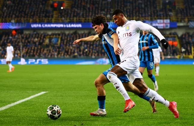 Kyriani Sabbe of Club Brugge and Marcus Rashford of Aston Villa. Club Brugge v Aston Villa, UEFA Champions League, Round of 16, First Leg, Football, Jan Breydel Stadium, Brugge, Belgium - 04 Mar 2025 EDITORIAL USE ONLY No use with unauthorised audio, video, data, fixture lists, club league logos or live services. Online in-match use limited to 120 images, no video emulation. No use in betting, games or single club league player publications.  Copyright: xJamesxMarsh Shutterstockx 15176976dh