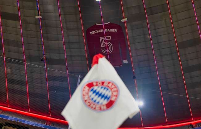 before the start of the match interior illuminated jersey no. 5 Franz Beckenbauer hangs under the roof of the south stand corner flag FC Bayern Muenchen FCB vs Bayer 04 Leverkusen B04 round of 16 first leg 05 03 2025 DFL REGULATIONS PROHIBIT ANY USE OF PHOTOGRAPHS AS IMAGE SEQUENCES AND OR QUASI VIDEO FC Bayern Muenchen FCB vs Bayer 04 Leverkusen B04