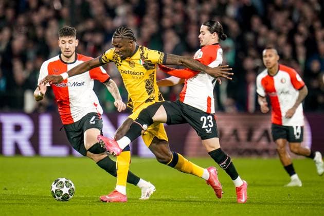 ROTTERDAM, 05-03-2025 , Stadium Feijenoord de Kuip , UEFA Champions League round of 16 leg 1 of 2 season 2024 2025 , match between Feyenoord and Inter Milan , Feyenoord player Marcus Thuram and Feyenoord player Anis Hadj Moussa Feyenoord - Inter Milan  x28178693x Copyright: