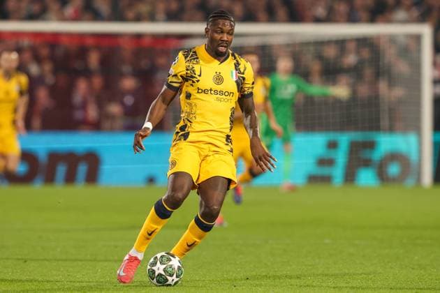 2025-03-05 Feyenoord v FC Internazionale Milano - UEFA Champions League 2024 25 Round of 16 First Leg ROTTERDAM, NETHERLANDS - MARCH 5: Marcus Thuram of FC Internazionale Milano runs with the ball during the UEFA Champions League 2024 25 Round of 16 First Leg match between Feyenoord and FC Internazionale Milano at Stadion Feijenoord on March 5, 2025 in Rotterdam, Netherlands. Rotterdam Stadion Feijenoord Netherlands Content not available for redistribution in The Netherlands directly or indirectly through any third parties. Copyright: xHansxvanxderxValkx