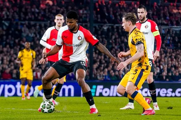 ROTTERDAM, 05-03-25, Stadium de Kuip, Champions League, 2024 2025, Feyenoord - Feyenoord Inter Milan, Feyenoord player Jeyland Mitchell and Inter Milan player Nicolo Barella Feyenoord Inter Milan  x28179187x Copyright: