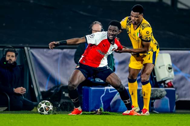 Feyenoord Rotterdam forwarder Ibrahim Osman, FC Internazionale Milan defender Denzel Dumfries during the match Feyenoord Inter at the Stadium De Kuip for the UEFA Champions League Round of 16 1st leg season 2024 2025 in ROTTERDAM, Netherlands on 5 march 2025, photo by Marcel van Dorst EYE4images DeFodi Images