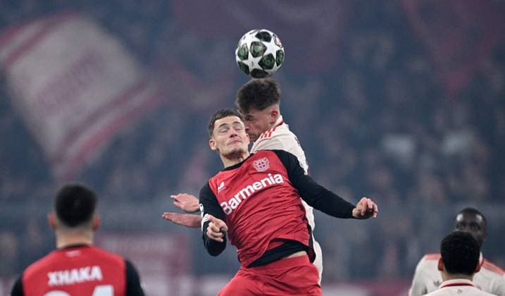 FOOTBALL CHAMPIONS LEAGUE SEASON 2024 2025 Round of 16 first leg FC Bayern Muenchen Bayer 04 Leverkusen 05 03 2025 Florian Wirtz left, Bayer 04 Leverkusen with Joshua Kimmich right, FC Bayern Muenchen