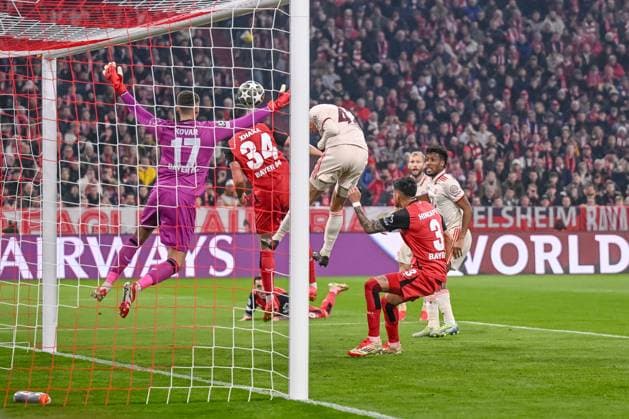 Goalkeeper Matej Kovar Bayer 04 Leverkusen , Granit Xhaka Bayer 04 Leverkusen and Jamal Musiala FC Bayern Muenchen battle for the ball during the UEFA Champions League 2024 25 Round of 16 First Leg match between FC Bayern München and Bayer 04 Leverkusen at Allianz Arena on March 5, 2025 in Munich, Germany Photo by Harry Langer DeFodi Images