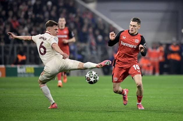 05 03 2025, xemx, Football UEFA Champions League, FC Bayern Muenchen Bayer 04 Leverkusen v l Joshua Kimmich FC Bayern Muenchen Florian Wirtz Bayer Leverkusen Zweikampf, Aktion, action, battle for the ball DFL DFB REGULATIONS PROHIBIT ANY USE OF PHOTOGRAPHS as IMAGE SEQUENCES and or QUASI VIDEO Muenchen