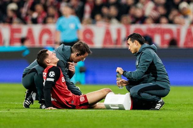 UEFA Champions League, FC Bayern Munich Bayer 04 Leverkusen 05 03 2025 Florian Wirtz Bayer 04 Leverkusen, 10 must be treated for an injury UEFA Champions League round of 16 first leg, FC Bayern Munich Bayer 04 Leverkusen Munich, Allianz Arena on 05 03 2025 Copyright: xBEAUTIFULxSPORTS Wunderlx