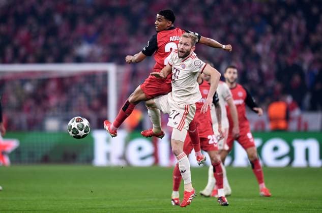 FOOTBALL CHAMPIONS LEAGUE SEASON 2024 2025 Round of 16 first leg FC Bayern Muenchen Bayer 04 Leverkusen 05 03 2025 Amine Adli left, Bayer 04 Leverkusen vs Konrad Laimer right, FC Bayern Muenchen