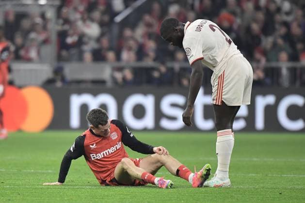 05 03 2025, xemx, Football UEFA Champions League, FC Bayern Muenchen Bayer 04 Leverkusen v l Florian Wirtz Bayer Leverkusen injured, injury, pain, pain Dayot Upamecano FC Bayern Muenchen DFL DFB REGULATIONS PROHIBIT ANY USE OF PHOTOGRAPHS as IMAGE SEQUENCES and or QUASI VIDEO Muenchen