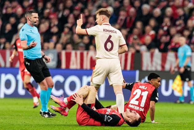 UEFA Champions League, FC Bayern Munich Bayer 04 Leverkusen 05 03 2025 Florian Wirtz Bayer 04 Leverkusen, 10 stays down with pain UEFA Champions League round of 16 first leg, FC Bayern Munich Bayer 04 Leverkusen Munich, Allianz Arena on 05 03 2025 Copyright: xBEAUTIFULxSPORTS Wunderlx