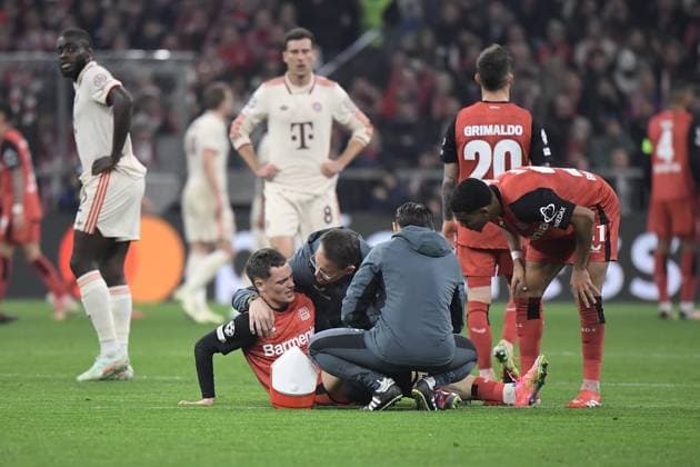 05 03 2025, xemx, Football UEFA Champions League, FC Bayern Muenchen Bayer 04 Leverkusen v l Florian Wirtz Bayer Leverkusen injured, injury, pain, aches DFL DFB REGULATIONS PROHIBIT ANY USE OF PHOTOGRAPHS as IMAGE SEQUENCES and or QUASI VIDEO Muenchen