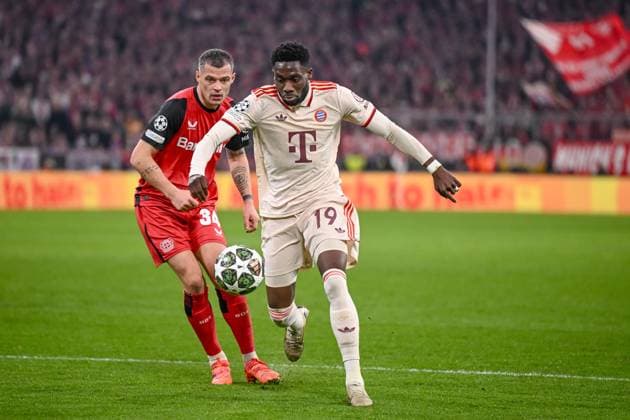 Granit Xhaka Bayer 04 Leverkusen and Alphonso Davies FC Bayern Muenchen battle for the ball during the UEFA Champions League 2024 25 Round of 16 First Leg match between FC Bayern München and Bayer 04 Leverkusen at Allianz Arena on March 5, 2025 in Munich, Germany Photo by Harry Langer DeFodi Images
