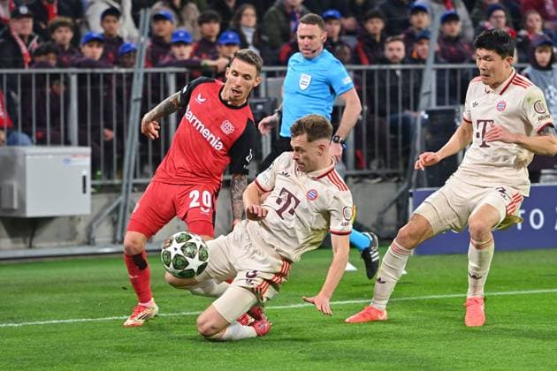 from left Alejandro GRIMALDO Bayer Leverkusen , action,duel against Joshua KIMMICH Bayern Muenchen ,right Minjae KIM FC Bayern Muenchen Soccer Champions League Round of 16 FC Bayern Muenchen Bayer 04 Leverkusen on 05 03 2025 , A L L I A N Z A R E N A