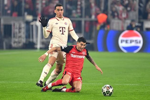Jamal MUSIALA Bayern Muenchen , action,duel against Exequiel PALACIOS Bayer Leverkusen Soccer Champions League Round of 16 FC Bayern Muenchen Bayer 04 Leverkusen on 05 03 2025 , A L L I A N Z A R E N A