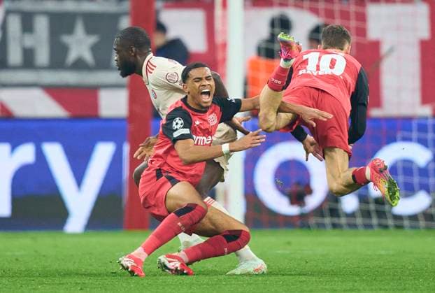 Sport Bilder des Tages Dayot Upamecano , FCB 2 compete for the ball, tackling, duel, header, zweikampf, action, fight against Florian Wirtz, Lev 10 Amine Adli, Lev 21 in the round of 16 first leg match FC BAYERN MUENCHEN - BAYER 04 LEVERKUSEN of football UEFA Champions League in season 2024 2025 in Munich, Mar 5, 2025 , FCB, x.Spieltag, München