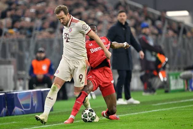 Muenchen, Allianz Arena, 05 03 25, GER, Men, UEFA Champions League, Season 2024 2025, Round of 16, FC Bayern Muenchen Bayer 04 Leverkusen Picture from left in duel Harry KANE Muenchen and Nordi MUKIELE Leverkusen UEFA regulations prohibit any use of photographs as image sequences and or quasi video Bayern Germany