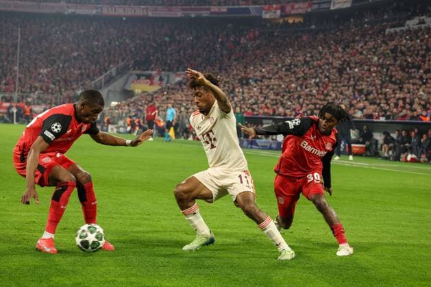 in duel, action, with Nordi Mukiele 23 Bayer 04 Leverkusen , Kingsley Coman 11 FC Bayern Muenchen , Jeremie Frimpong 30 Bayer 04 Leverkusen , FC Bayern Muenchen vs Bayer 04 Leverkusen, Football, Champions League, round of 16, first leg, 05 03 2025 Muenchen Bayern Germany Copyright: xkolbert-press MartinxAgüerax
