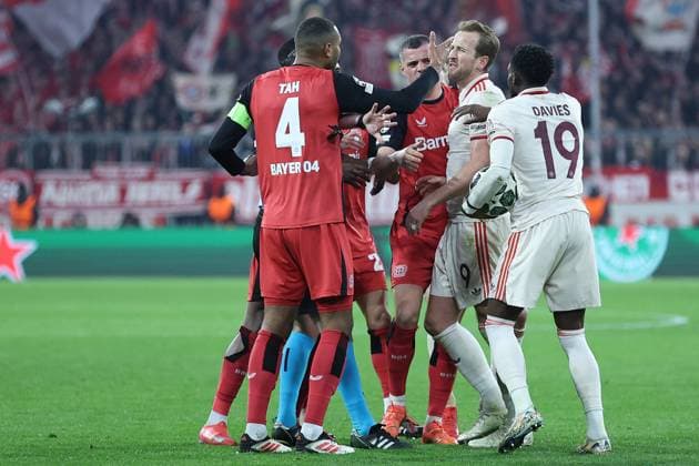 Soccer UEFA Champions League Round of 16 FC Bayern Munich Bayer 04 Leverkusen on 05 03 2025 at the Allianz Arena in Munich Jonathan Tah Leverkusen , left Harry Kane Munich , center Alphonso Davies Munich , right xMSx