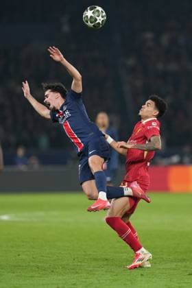 Luis Diaz of Liverpool out muscles Vitinha of PSG Paris Saint-Germain v Liverpool, UEFA Champions League, Round of 16, First Leg, Football, Parc des Princes, Paris, France - 05 Mar 2025 EDITORIAL USE ONLY No use with unauthorised audio, video, data, fixture lists, club league logos or live services. Online in-match use limited to 120 images, no video emulation. No use in betting, games or single club league player publications.  Copyright: xDavexWinter Shutterstockx 15178313bb