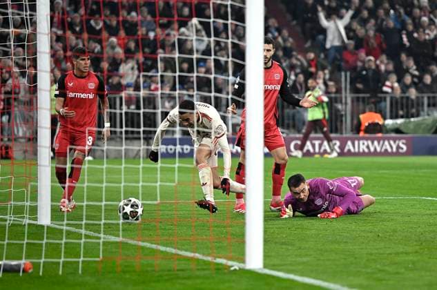 05 03 2025, Football UEFA Champions League 2024 2025 Round of 16, FC Bayern Munich Bayer 04 Leverkusen, at Allianz Arena Munich Goal to 2 0 by scorer Jamal Musiala Bayern Munich after mistake by goalkeeper Matej Kovar Bayer Leverkusen DFL and DFB regulations prohibit any use of photographs as image sequences and or quasi video