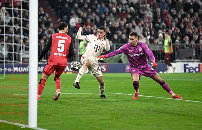 05 03 2025, Football UEFA Champions League 2024 2025 Round of 16, FC Bayern Munich Bayer 04 Leverkusen, at Allianz Arena Munich Goal to 2 0 by scorer Jamal Musiala Bayern Munich after mistake by goalkeeper Matej Kovar Bayer Leverkusen DFL and DFB regulations prohibit any use of photographs as image sequences and or quasi video