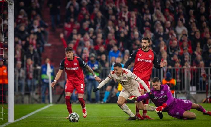 Munich, Germany 05th Mar 2025 Jamal Musiala FCB scores the goal to make it 2 0 against Matej Kovar LEV Mario Hermoso LEV FC Bayern München Bayer Leverkusen 05 03 2025