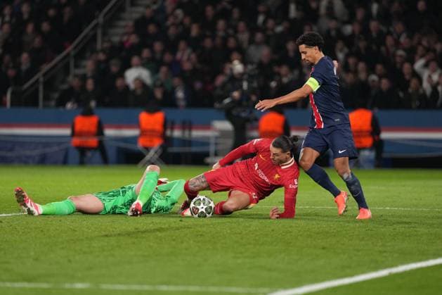 A mad scramble in the penalty area as Darwin Nunez of Liverpool, Marquinhos of PSG and Gianluigi Donnarumma of PSG all compete for a loose ball Paris Saint-Germain v Liverpool, UEFA Champions League, Round of 16, First Leg, Football, Parc des Princes, Paris, France - 05 Mar 2025 EDITORIAL USE ONLY No use with unauthorised audio, video, data, fixture lists, club league logos or live services. Online in-match use limited to 120 images, no video emulation. No use in betting, games or single club league player publications.  Copyright: xDavexWinter Shutterstockx 15178313br