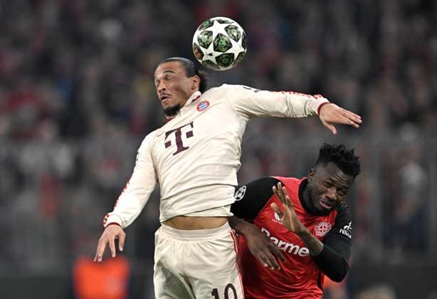 05 03 2025, Football UEFA Champions League 2024 2025 Round of 16, FC Bayern Munich Bayer 04 Leverkusen, at Allianz Arena Munich L R Leroy Sane Bayern Munich vs Edmond Tapsoba Bayer Leverkusen DFL and DFB regulations prohibit any use of photographs as image sequences and or quasi video