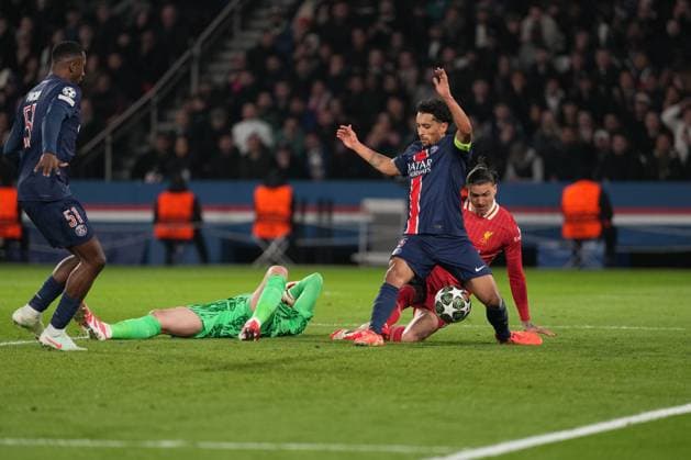 A mad scramble in the penalty area as Darwin Nunez of Liverpool, Marquinhos of PSG and Gianluigi Donnarumma of PSG all compete for a loose ball Paris Saint-Germain v Liverpool, UEFA Champions League, Round of 16, First Leg, Football, Parc des Princes, Paris, France - 05 Mar 2025 EDITORIAL USE ONLY No use with unauthorised audio, video, data, fixture lists, club league logos or live services. Online in-match use limited to 120 images, no video emulation. No use in betting, games or single club league player publications.  Copyright: xDavexWinter Shutterstockx 15178313bt