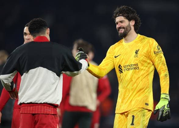 Paris, France, 5th March 2025. Alisson Becker of Liverpool celebrates after the UEFA Champions League match Paris Saint Germain vs Liverpool at Le Parc des Princes, Paris. Picture credit should read: Paul Terry Sportimage EDITORIAL USE ONLY. No use with unauthorised audio, video, data, fixture lists, club league logos or live services. Online in-match use limited to 120 images, no video emulation. No use in betting, games or single club league player publications. SPI_052_PT_PSG_Liverpool SPI-3726-0052