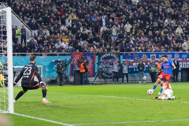 Thu 6 March, UEFA Europa League, Round of 16,1st leg, National Arena, Bucharest, FCSB vs LYON 25 Alexandru Baluta scores his side first goal of the match