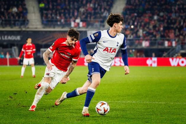 AZ Alkmaar forwarder Troy Parrot, Tottenham Hotspur player Archie Gray during the match AZ Tottenham at the AFAS stadium for the UEFA Europa League Round of 16 1st leg season 2024 2025 in ALKMAAR, Netherlands on 6 march 2025, photo by Jules van Iperen EYE4images DeFodi Images