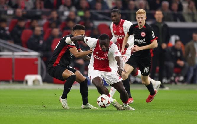 06 03 2025, Football UEFA Europa League, AFC Ajax Amsterdam Eintracht Frankfurt, emonline, emspor, v l , Tuta Lucas Silva Melo Eintracht Frankfurt , Brian Brobbey Ajax Amsterdam DFL DFB REGULATIONS PROHIBIT ANY USE OF PHOTOGRAPHS AS IMAGE SEQUENCES AND OR QUASI VIDEO xdcx Copyright: HMBxMedia Claus