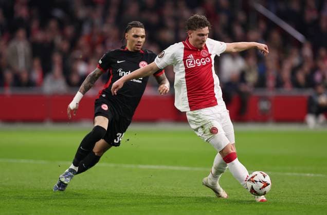 06 03 2025, Football UEFA Europa League, AFC Ajax Amsterdam Eintracht Frankfurt, emonline, emspor, v l , Pharell Nnamdi Collins Eintracht Frankfurt , Mika Godts Ajax Amsterdam DFL DFB REGULATIONS PROHIBIT ANY USE OF PHOTOGRAPHS AS IMAGE SEQUENCES AND OR QUASI VIDEO xdcx Copyright: HMBxMedia Claus