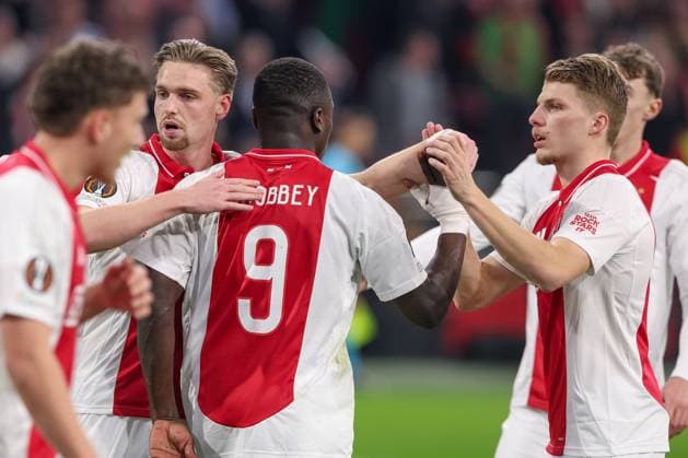 2025-03-06 AFC Ajax v Eintracht Frankfurt - UEFA Europa League 2024 25 Round of 16 First Leg AMSTERDAM, NETHERLANDS - MARCH 6: Kenneth Taylor of AFC Ajax, Brian Brobbey of AFC Ajax, Anton Gaaei of AFC Ajax celebrates after scoring the first goal of the team during the UEFA Europa League 2024 25 Round of 16 First Leg match between AFC Ajax and Eintracht Frankfurt at Johan Cruijff ArenA on March 6, 2025 in Amsterdam, Netherlands. Amsterdam Johan Cruijff ArenA Netherlands Content not available for redistribution in The Netherlands directly or indirectly through any third parties. Copyright: xHansxvanxderxValkx