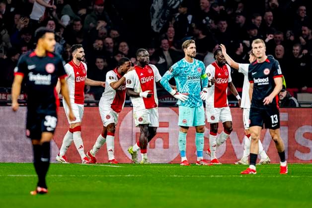 AFC Ajax Amsterdam forwarder Brian Brobbey scores the 1 0 and celebrating the goal, Eintracht Frankfurt goalkeeper Kevin Trapp dejected during the match Ajax Eintracht at the Johan Cruijff ArenA for the UEFA Europa League Round of 16 1st leg season 2024 2025 in AMSTERDAM, Netherlands on 6 march 2025, photo by Marcel van Dorst EYE4images DeFodi Images