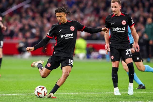 2025-03-06 AFC Ajax v Eintracht Frankfurt - UEFA Europa League 2024 25 Round of 16 First Leg AMSTERDAM, NETHERLANDS - MARCH 6: Jean-Matteo Bahoya of Eintracht Frankfurt kicks the ball during to the UEFA Europa League 2024 25 Round of 16 First Leg match between AFC Ajax and Eintracht Frankfurt at Johan Cruijff ArenA on March 6, 2025 in Amsterdam, Netherlands. Amsterdam Johan Cruijff ArenA Netherlands Content not available for redistribution in The Netherlands directly or indirectly through any third parties. Copyright: xBenxGalx